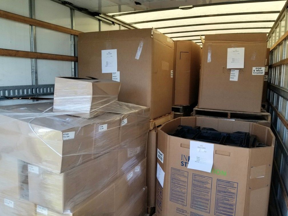 Packed boxes and packing supplies